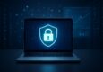 A laptop displaying a digital lock symbol on a dark background, representing cybersecurity and data protection.